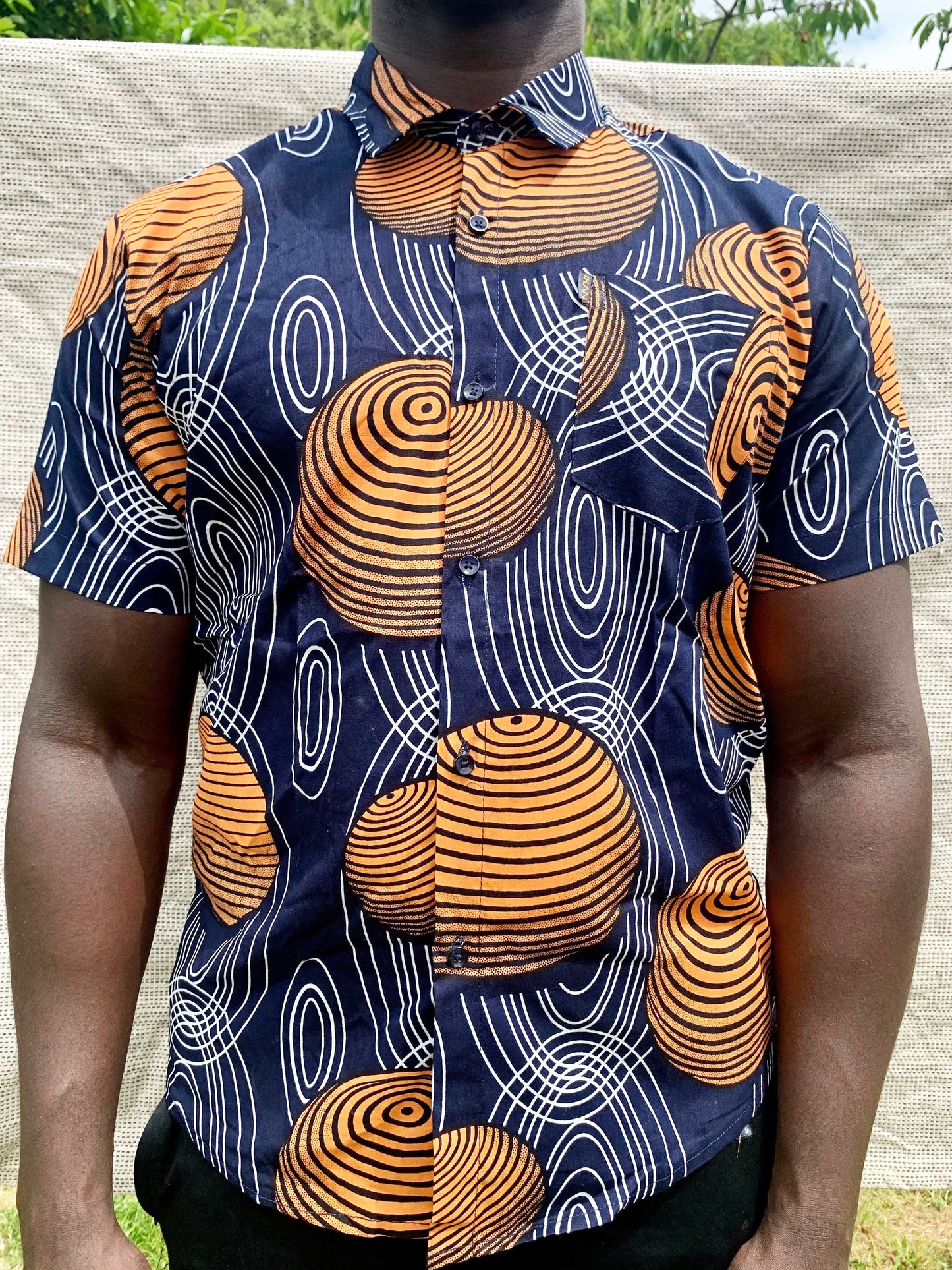 Navy, orange & white spheres design ankara wax print short sleeve buttoned shirt with front pocket,