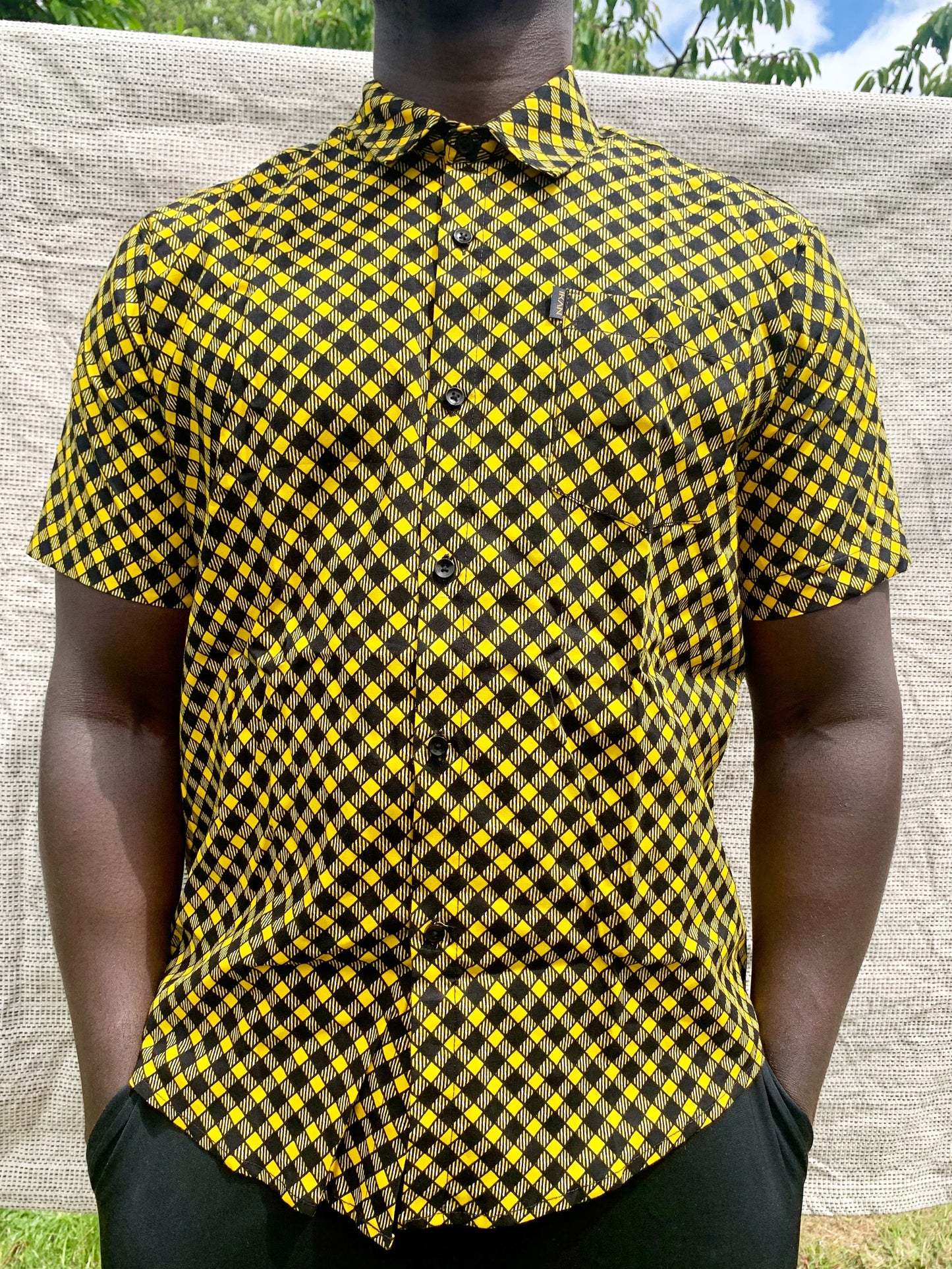 Black & yellow check pattern wax print short sleeve buttoned shirt with front pocket