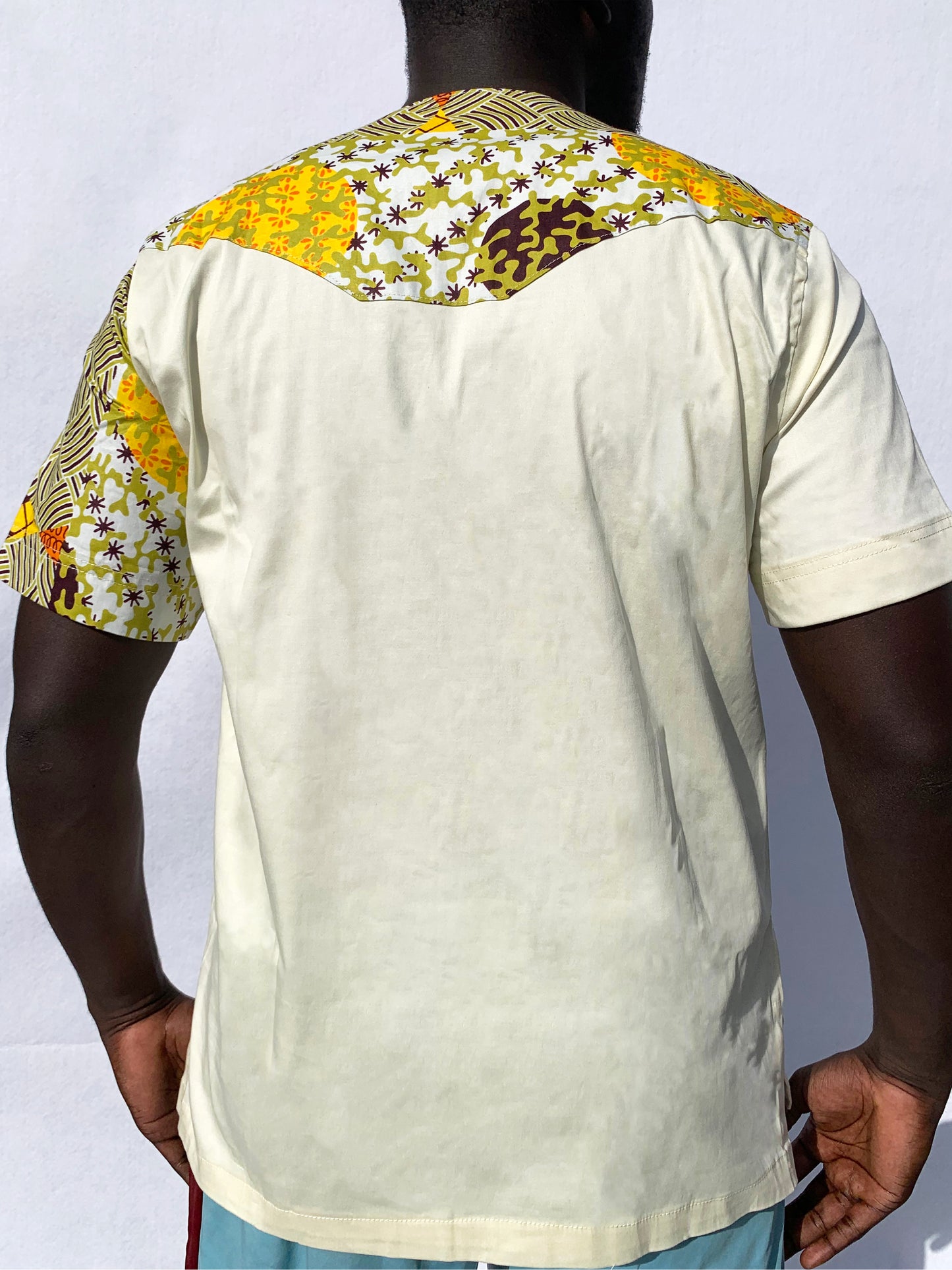 Short sleeve contrasting green / off-white & ankara round neck top