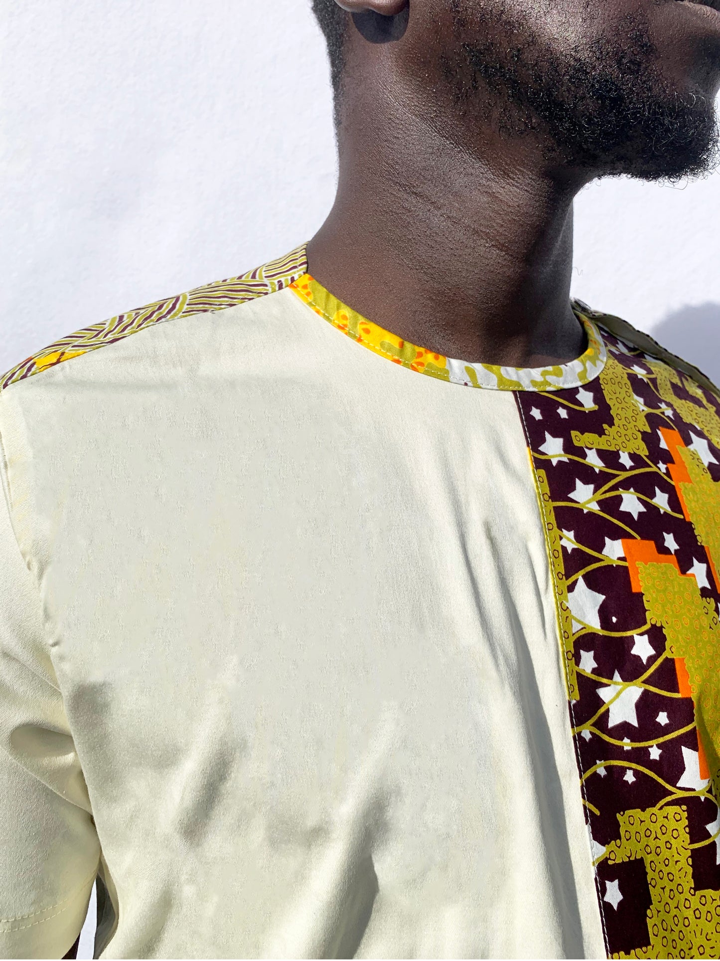 Short sleeve contrasting green / off-white & ankara round neck top